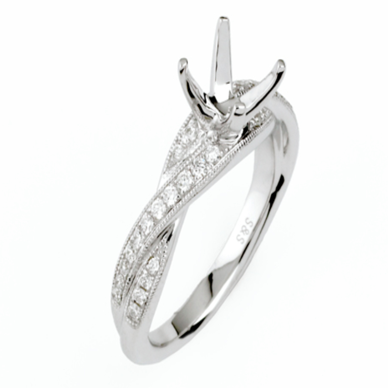 Cross over diamond engagement ring