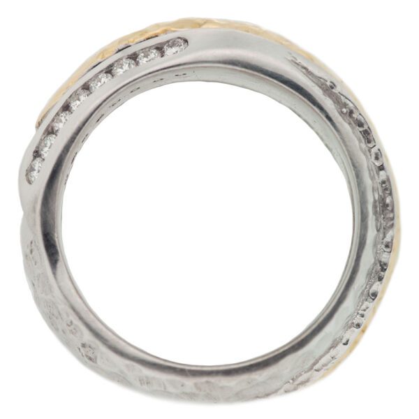 Metal and diamond ring, upright