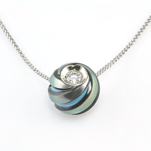 TURQUOISE PEARL AND DIAMOND PENDANT IN 14 KARAT WHITE GOLD