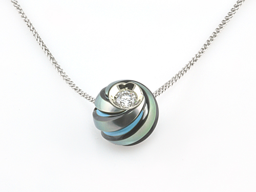 TURQUOISE PEARL AND DIAMOND PENDANT IN 14 KARAT WHITE GOLD