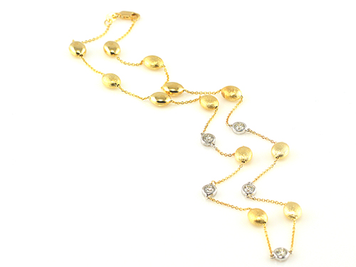 two tone bezel diamond necklace in 14 karat gold