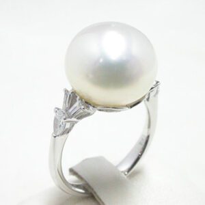 akoya pearl with baguette diamond ring in 18 karat white gold